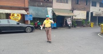 อำนวยการจราจรโครงการตักบาตรวันศุกร์